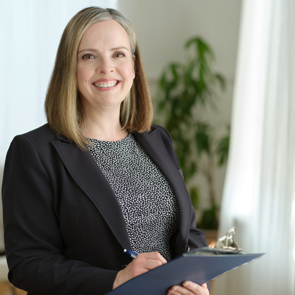 Professional headshot of Trish, the receptionist at Battell Denture Clinic.