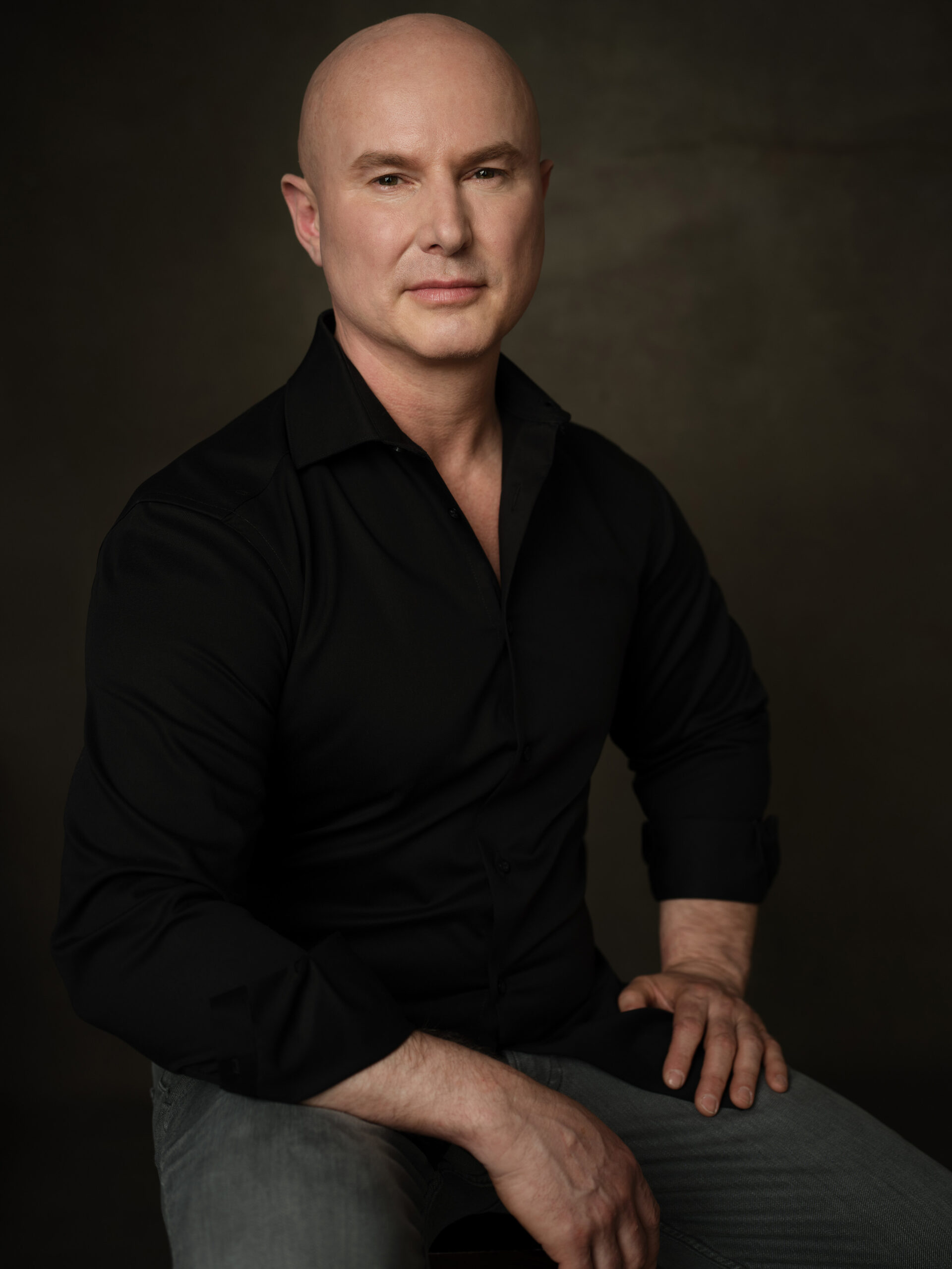 Michael Battell in black dress shirt