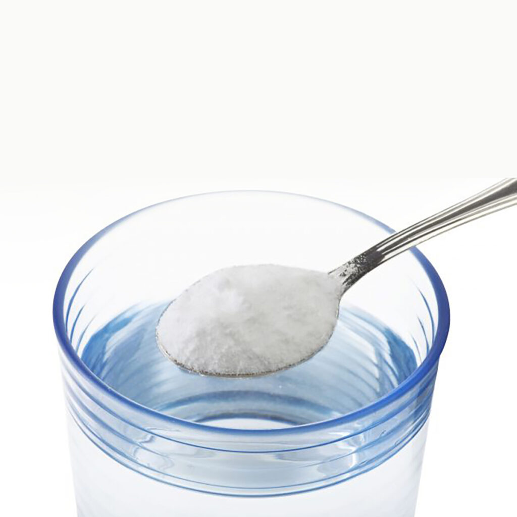 Spoonful of salt over a glass of water.